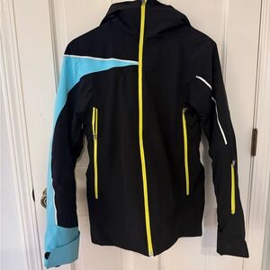 Spyder Spyder Syncere Women’s Ski Jacket in Black with Blue and yellow accents